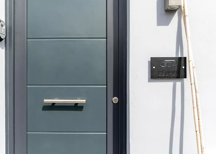 George & Joanna Santorini * Firá